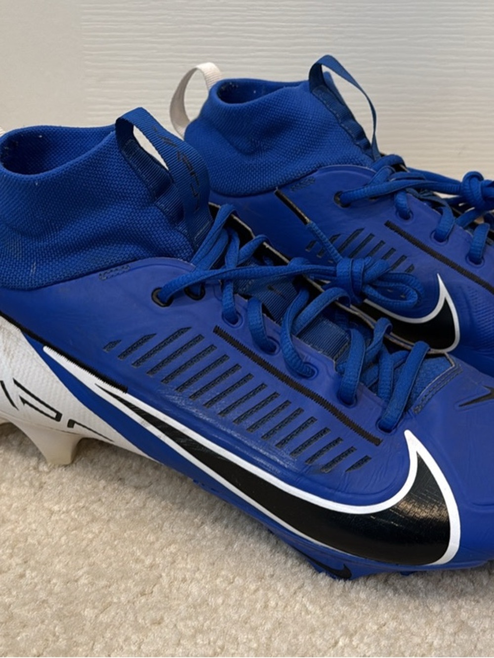 Nike Royal Blue Adult Football Cleats with Black and White Swoosh